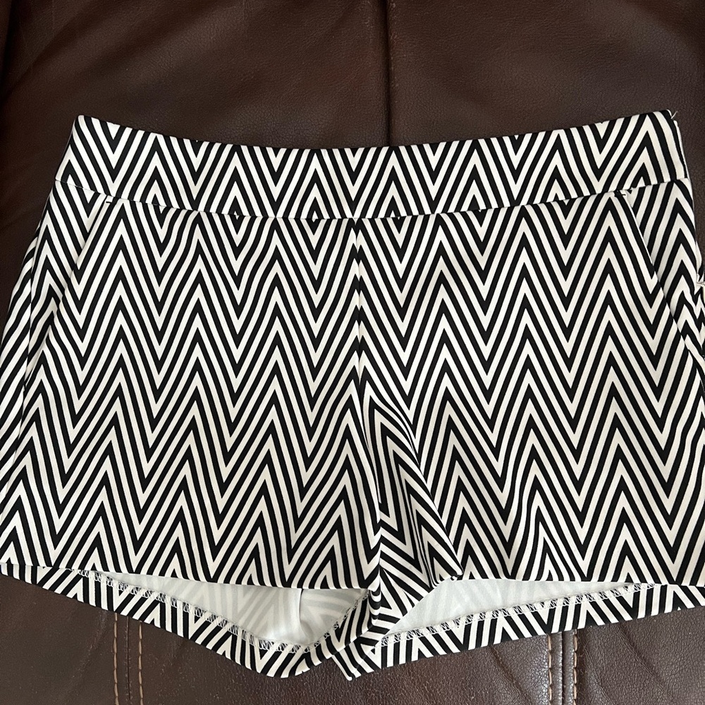 Express size 4 side zip shorts